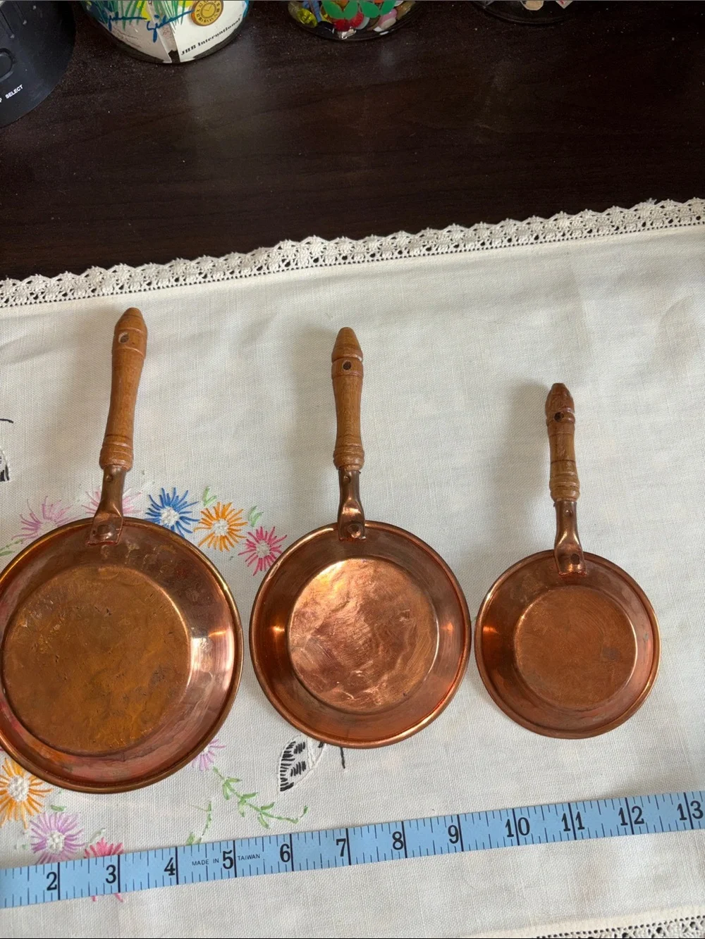 VINTAGE set of three decorative copper miniature frying pans with turned wooden
